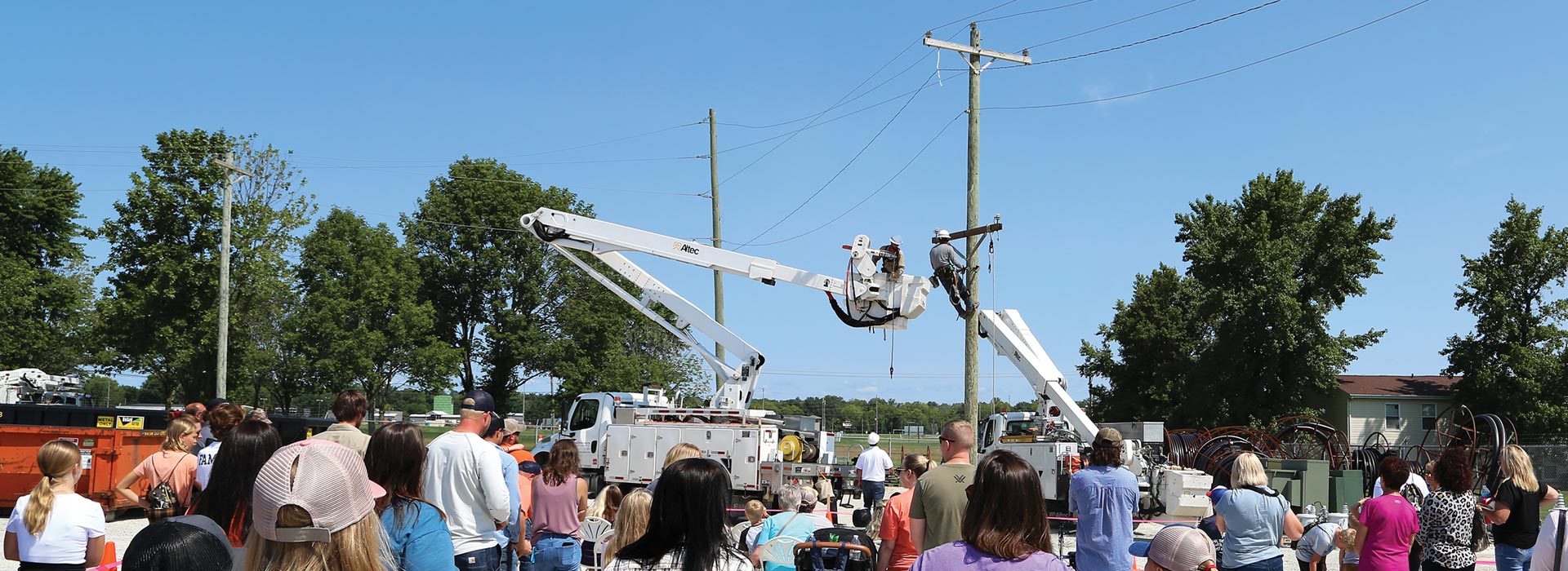 Employees view pole top rescue